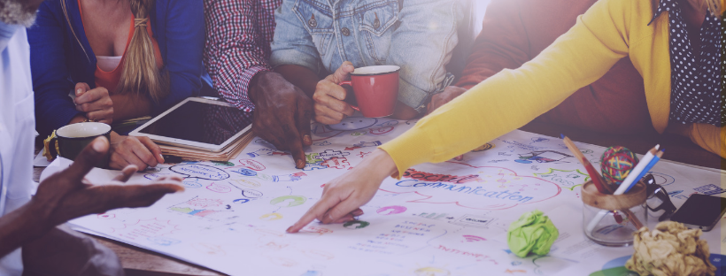 A team of people working on a creative project.
