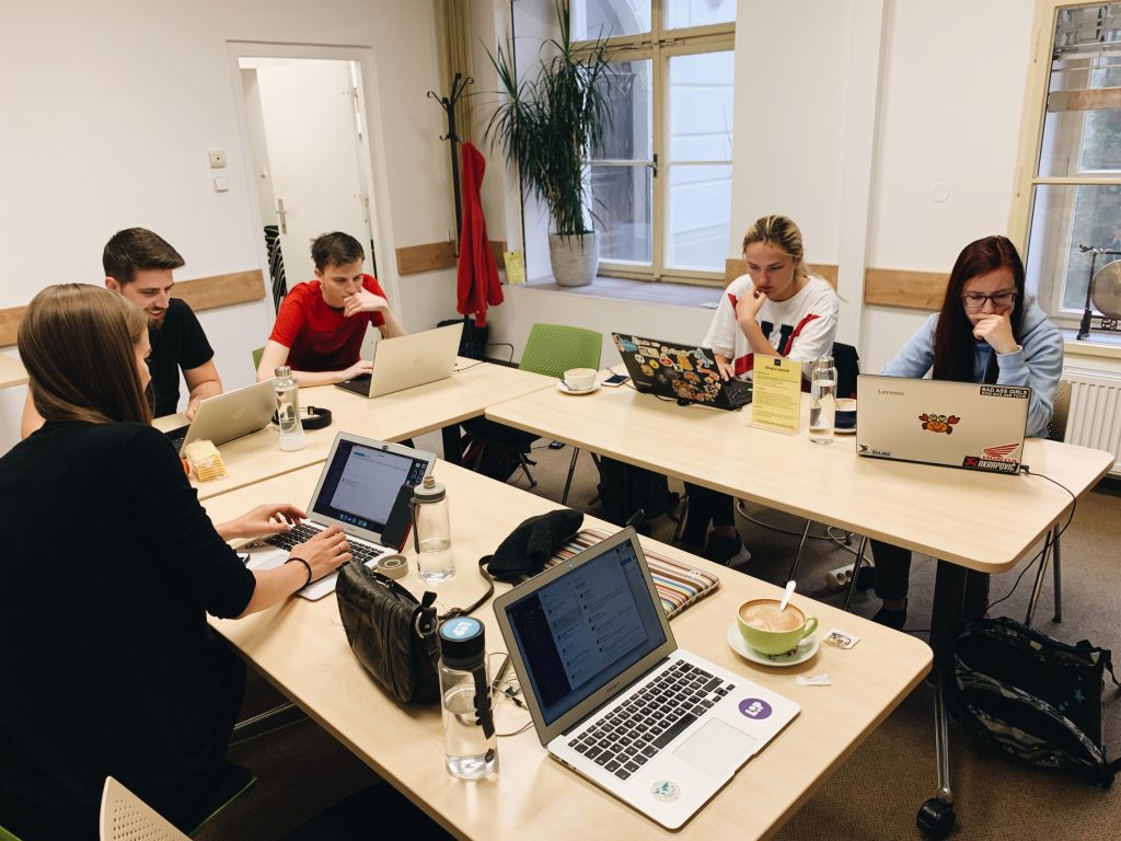 Participants working in a co-working space.