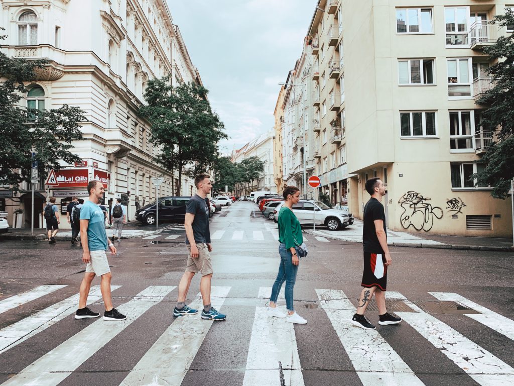 Team Four crossing the street like the Beatles.